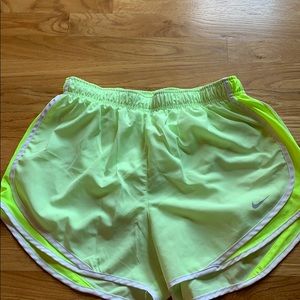 Nike women’s yellow and green shorts